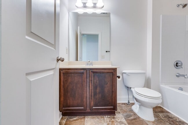 Building Photo - Welcome to this charming end unit townhome