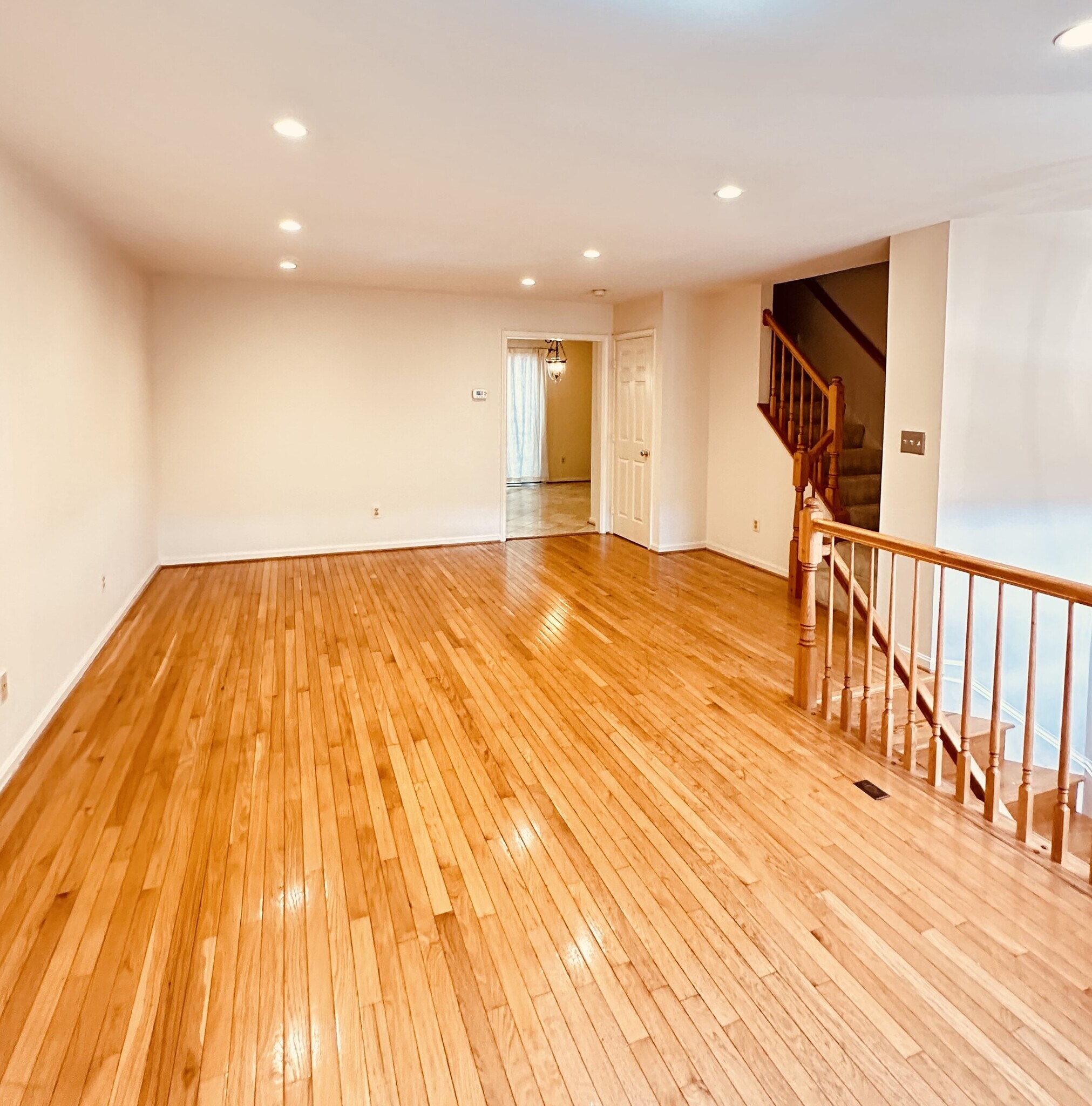 Living room and dining room with hardwood floors - 397 S Pickett St