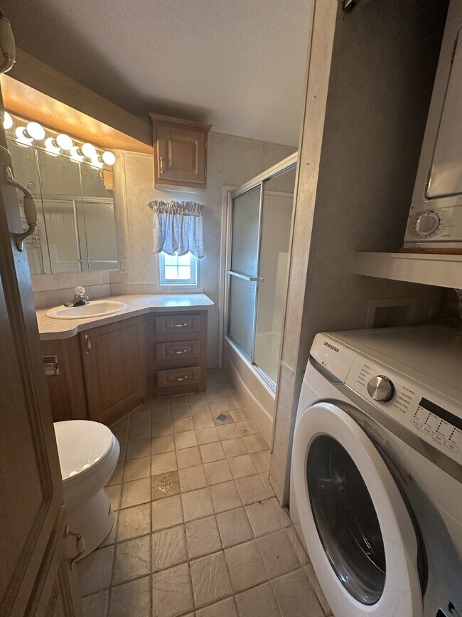 Building Photo - "Cozy and Convenient Water Front 2-Bedroom...