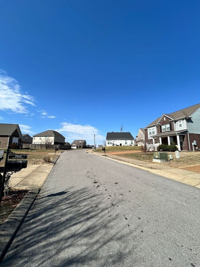 Building Photo - Spacious 5-Bedroom Home with Modern Amenit...