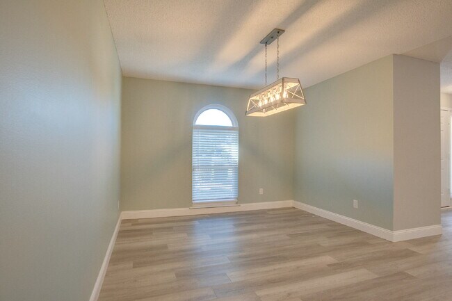 Building Photo - Lakefront 3BR/2BA Home on Orion Lake with Florida Room, Screened Patio, Hot Tub (As-Is), Solar Pa...