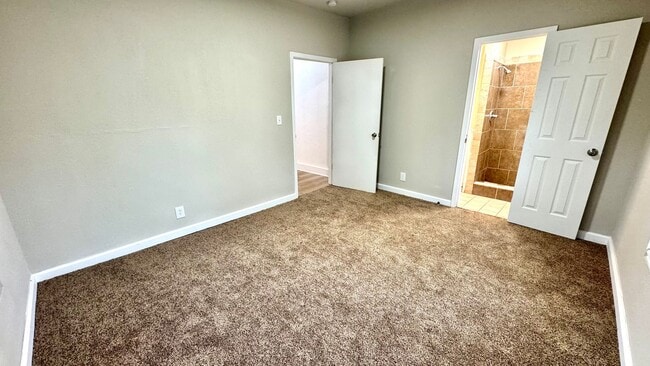 Building Photo - Spacious 3 Bedroom Home with Modern Updates & Shop