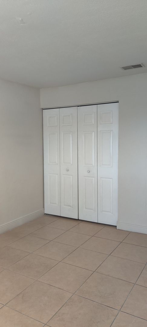 Building Photo - Newport Condominiums - 201