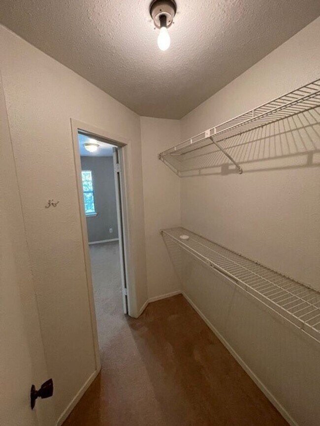 Building Photo - Spacious and bright 2 story condo!