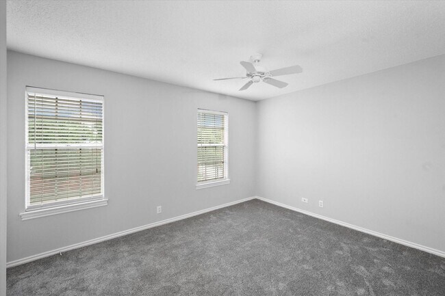 Building Photo - Luxury Townhome Living in the Prestigious Gated Community of Indian Creek – Available Now!