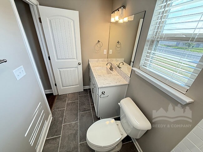 Building Photo - Welcome to this spacious 4 bedroom, 3 bath...