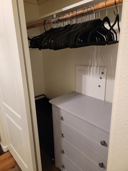 Wheeled, 2-section Laundry hamper, dresser in closet - 1608 Paraiso Dr