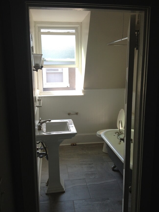 bathroom includes clawfoot tub with shower - 7042 Chew Ave