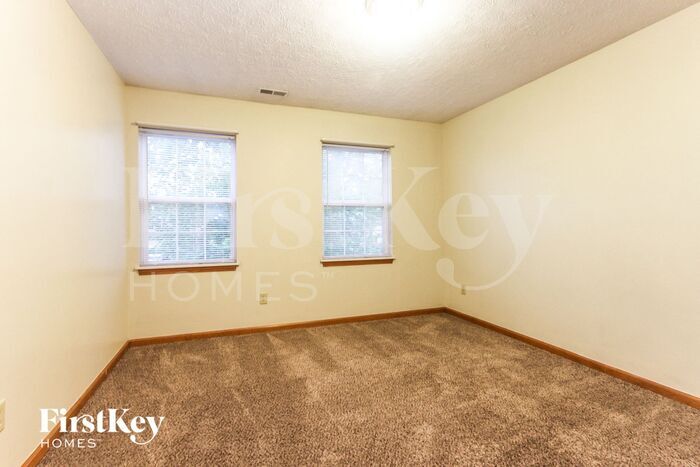 Building Photo - 1027 W Palomino Pl