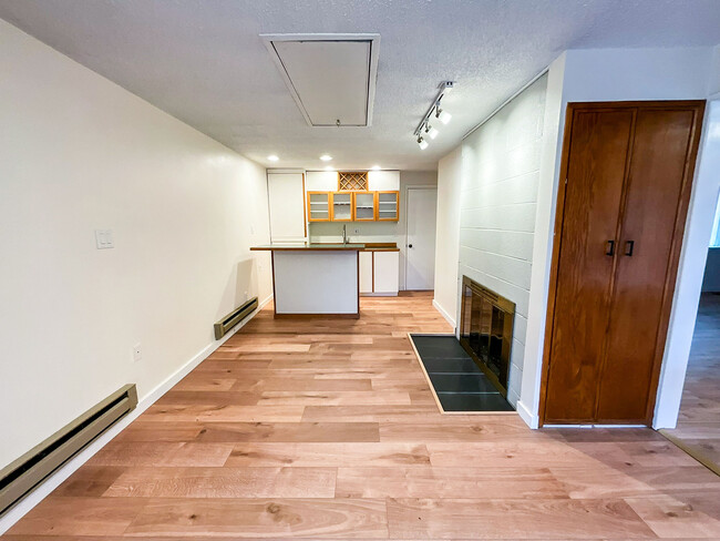 Den with second wood burning fireplace and wetbar for entertaining - 30126 2nd Ave SW