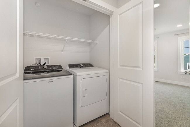Building Photo - Modern 2025 Townhome | Open-Concept Living, Chef’s Kitchen with Large Island & 2-Car Garage