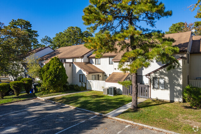 Building Photo - The Woodlands Condominiums