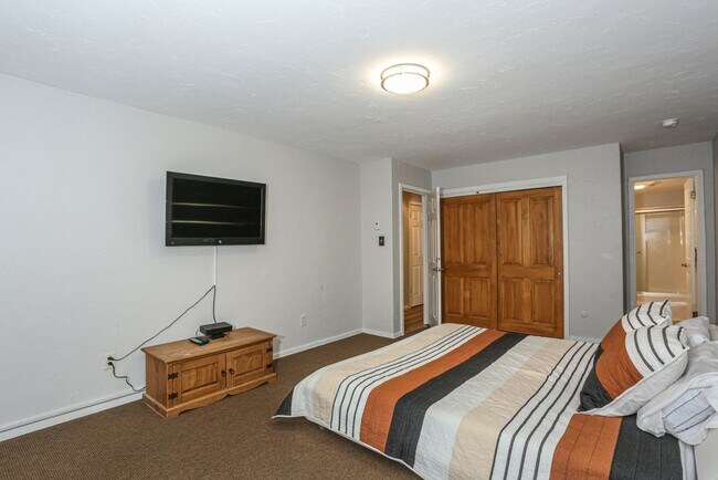 Building Photo - Walk to everything! Partially Furnished! Flexible lease terms!