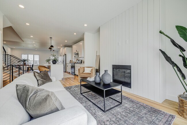Family room with kitchen in background - 3420 S Grant St
