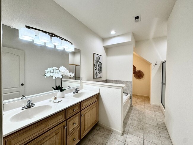 Building Photo - READY NOW!! End-Unit Loft-Style Condo w/1s...