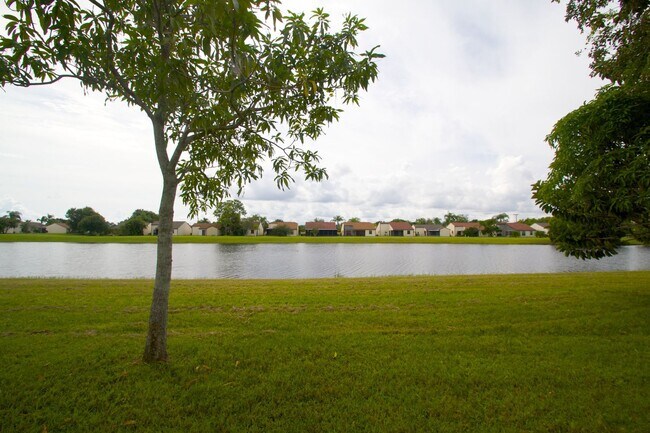 Building Photo - Waterfront 3BR Home on Canal | Spacious Yard | Lawn Care Included | Pet Friendly