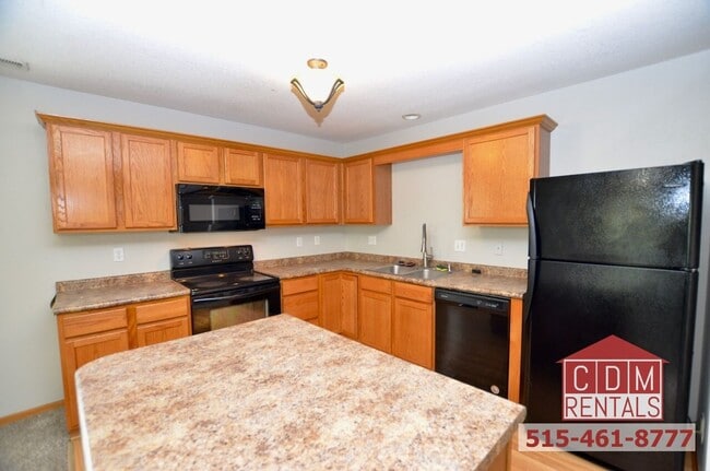 Building Photo - Wonderful Waukee Townhome