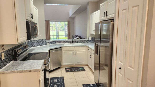 Building Photo - 3 BR 2.5 BA 1 CG rental in secure gated To...