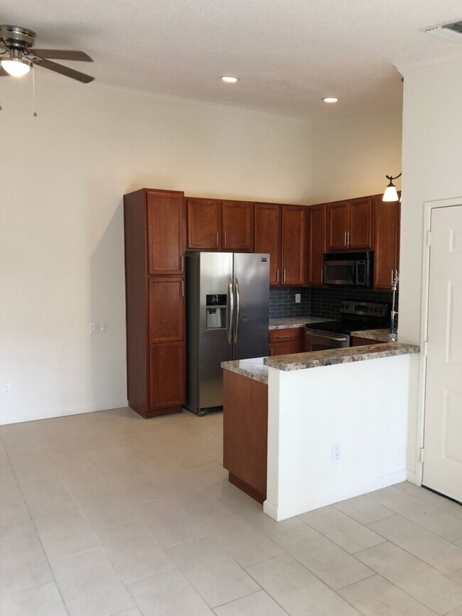 Building Photo - Beautiful 2-Bedroom Condo in Gated Saddleb...