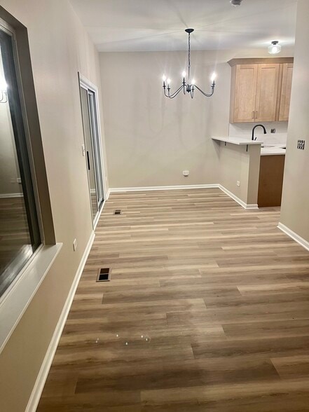 Dining area shows off the new flooring throughout - 17537 S Gilbert Dr