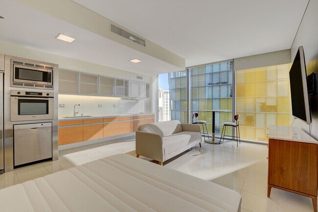 Building Photo - Stunning Strip Views from this Fully Furnished Studio Residence.