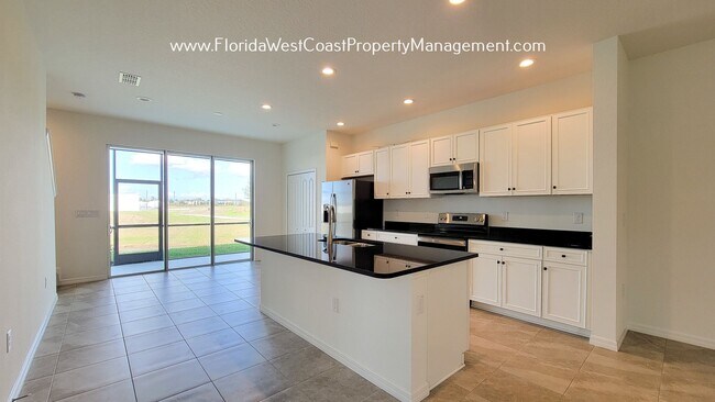 Building Photo - NORTH RIVER RANCH CORNER TOWNHOME! AVAILABE IN MARCH 2026 -LONG TERM LEASE!