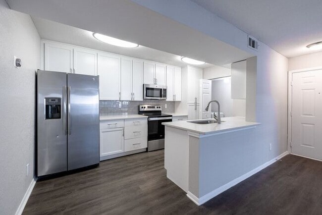 Building Photo - Spacious 2-Bedroom Elite Apartment with Private Balconies & Washer/Dryer