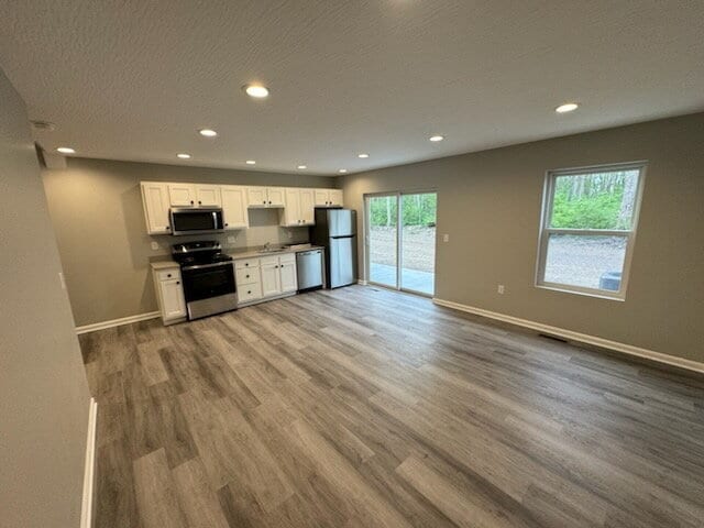 Building Photo - Brand-New 2 Bed / 1.5 Bath Townhome with Modern Finishes