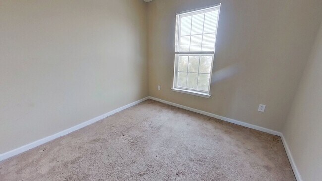 Building Photo - Spacious 3-Story Townhouse with One-Car Garage