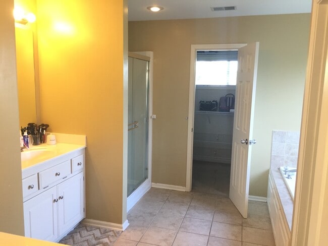 Building Photo - {7301} Quiet Cul-de-sac + Three Car Garage + Updated Kitchen + Finished Basement + Bedroom Level ...