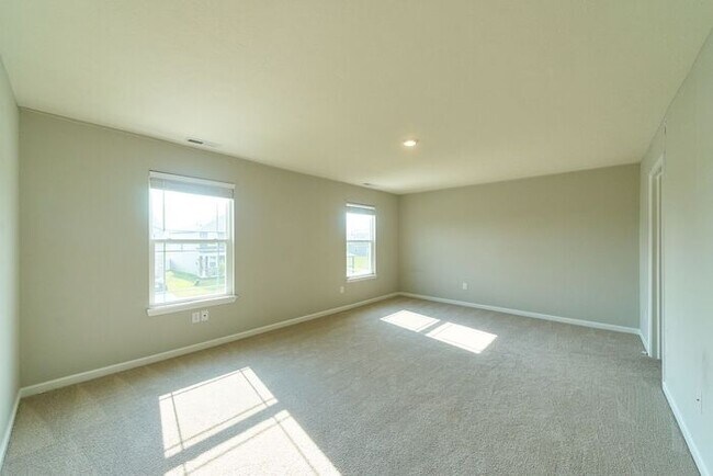 Building Photo - 4 Bedroom at Trotter's Landing in Camby With Pond View!