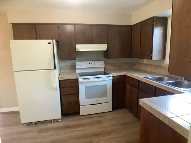 Building Photo - Three bedroom home with large yard| Available July!