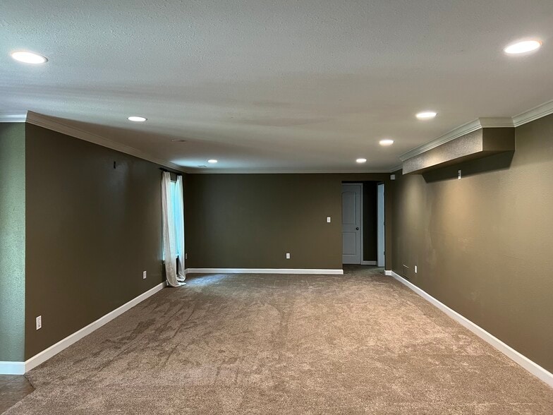 Living room (downstairs) - 4701 Rainbow Trout Dr