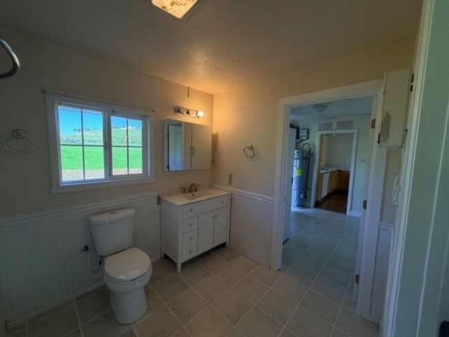 Building Photo - Charming 1 Bedroom Home with Bonus Room in a Serene, Secluded Setting