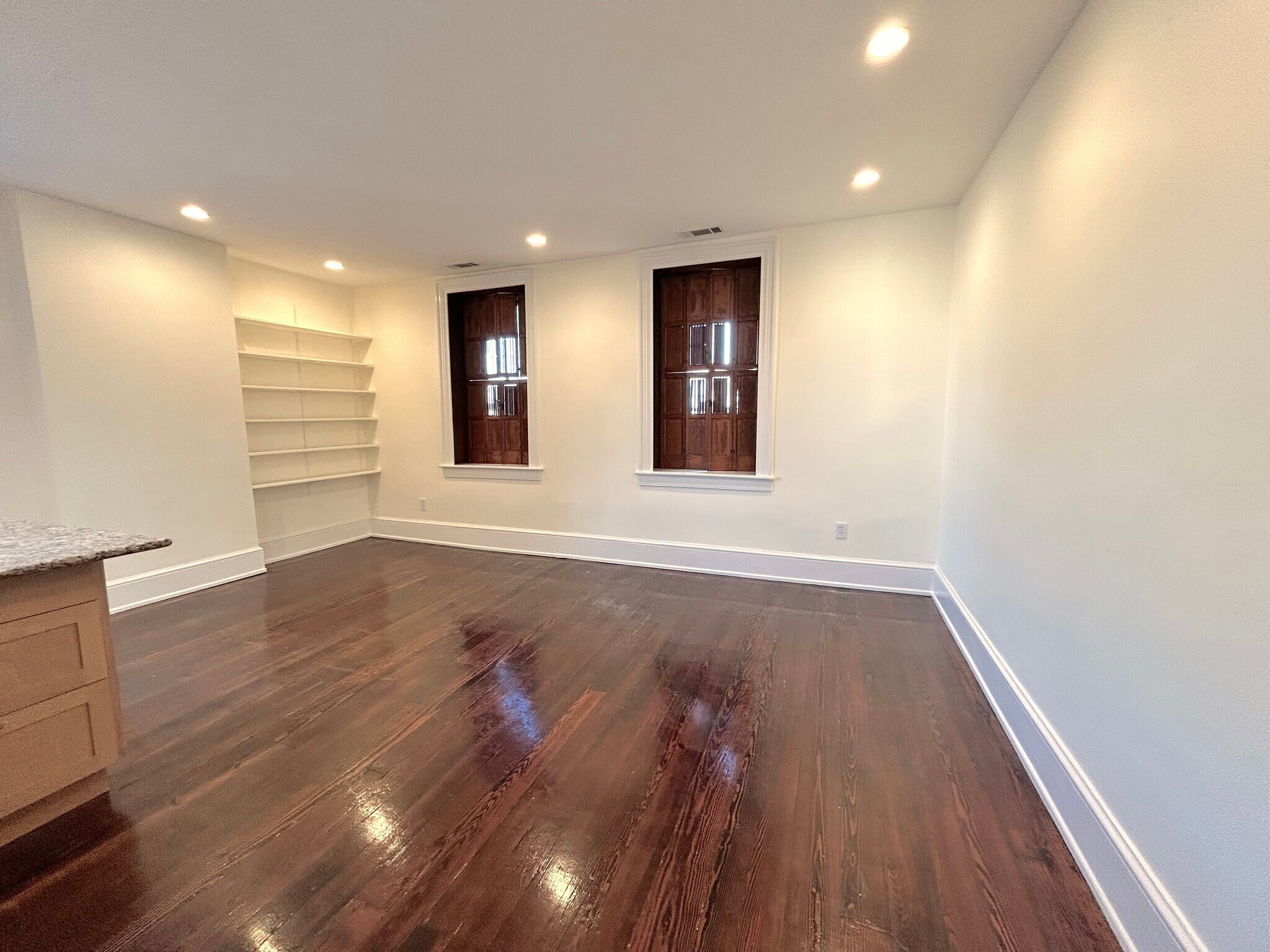 Living room (partial view) with shutters closed, 20' wide - 301 M St NW