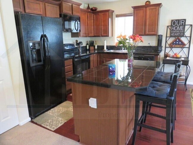 Building Photo - Beautiful 4 Bedroom Home located in a Gate...