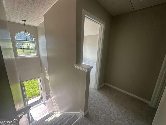 Building Photo - 7467 Petunia Dr