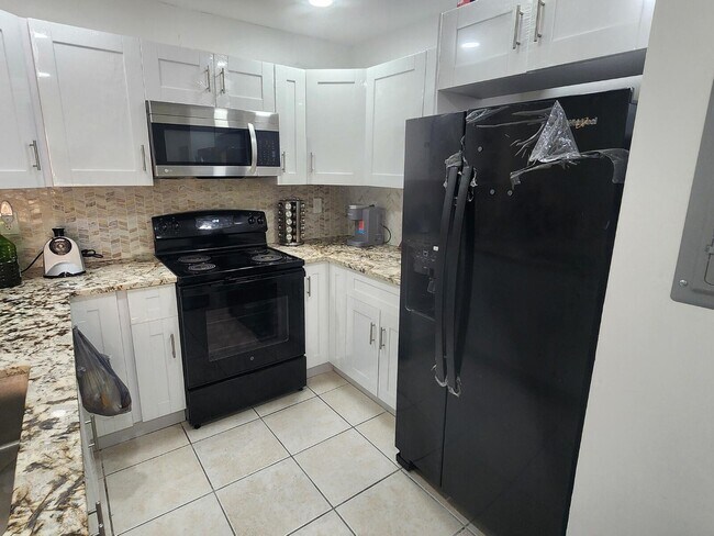 Building Photo - 6013 10th Ave N