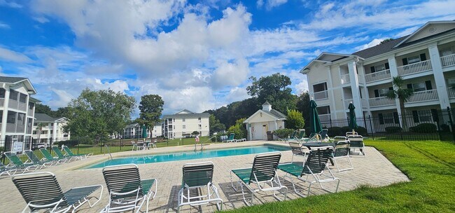 Building Photo - -First-Floor End-Unit | Fully Furnished 2B...