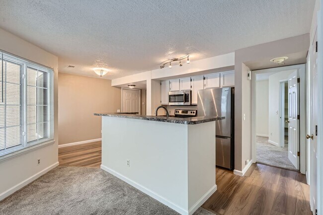 Building Photo - MOVE-IN SPECIAL ($500): Spacious Condo wit...