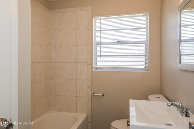 Building Photo - 7953 Patou Dr S