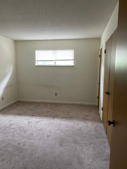 The bedroom has been repainted and the carpets deep cleaned. - 1412 11th St S