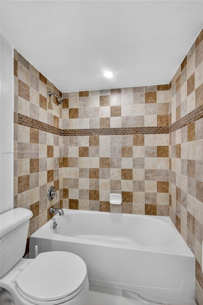 Building Photo - 9915 W Okeechobee Rd