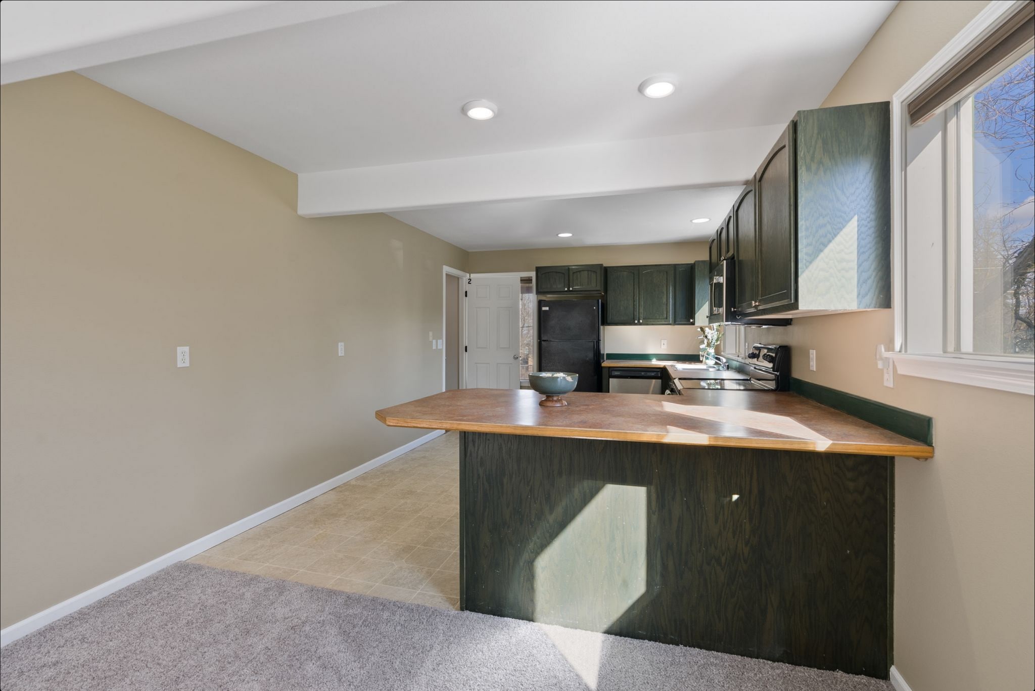 Main floor kitchen - 3519 E 25th Ave