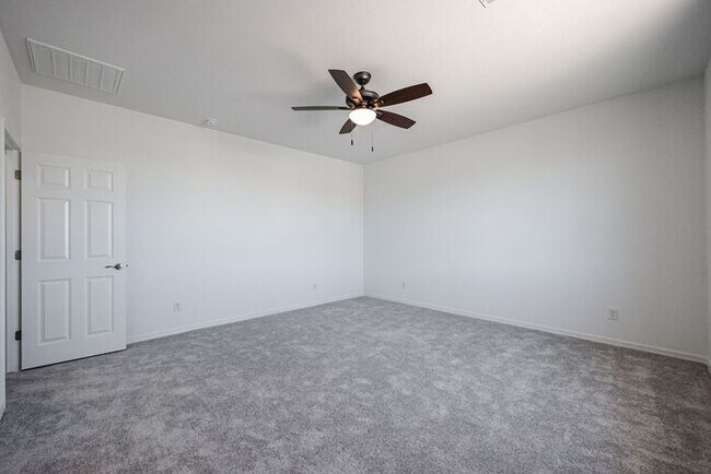 Building Photo - HOME IN LAVEEN! 4 BED 3.5 BA 3 CAR GARAGE!...