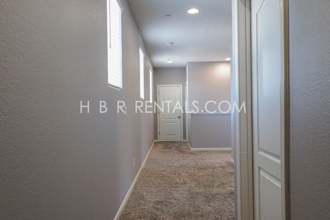 Building Photo - Questa Village: Spacious 3-Bedroom Retreat...