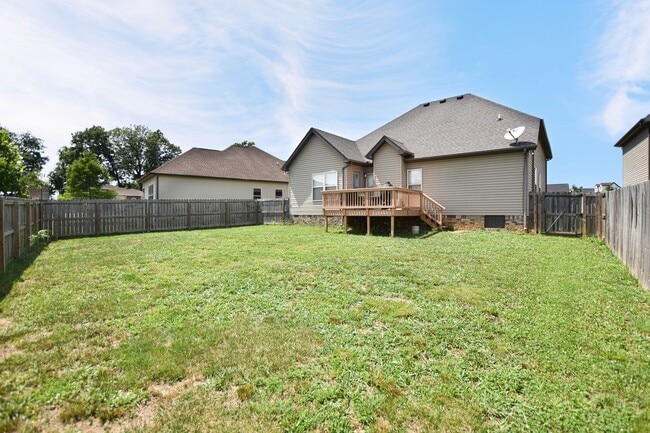 Building Photo - Pet Friendly Three Bedroom with Bonus!