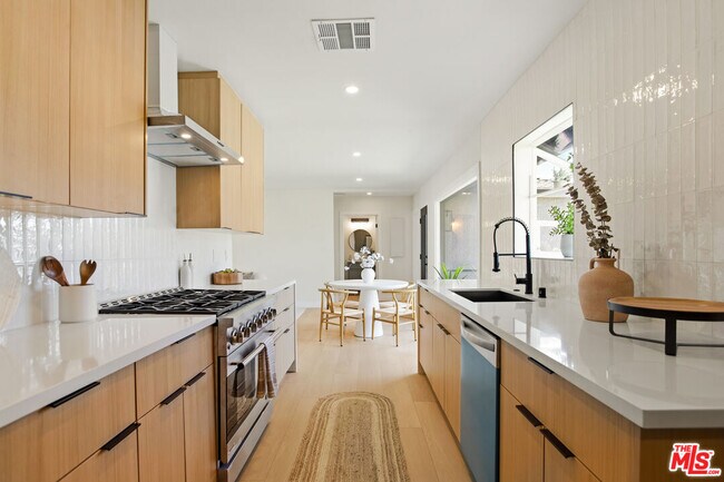 Building Photo - 7358 Paso Robles Ave