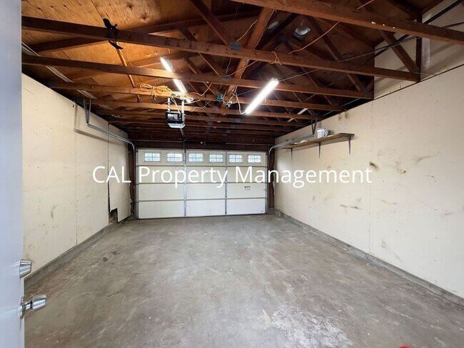 Building Photo - Spacious 4-Bedroom Home with 2-Car Garage & Backyard Oasis