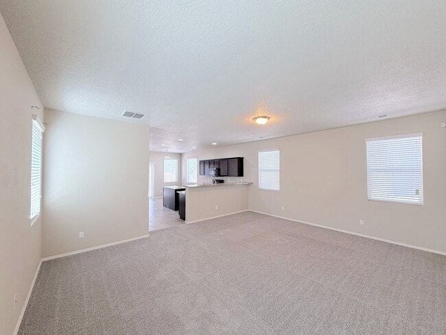 Building Photo - Beautiful 3-Bedroom Home in Tierra Oeste near Ladera/Unser. Refrigerated Air!